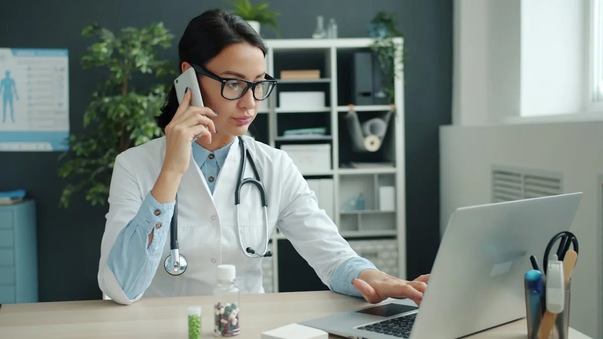 A Villa Family Clinic provider taking a scheduling call at her desk